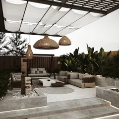 This rooftop retreat combines modern concrete planters with comfortable lounge seating and a swing. Wicker pendant lights and a fabric canopy add a soft, bohemian touch to the contemporary design.