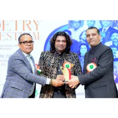 Another glimpse from the Dubai Poetry Festival award ceremony. Holding this award is a reminder of the blessings of the Almighty and the love of my fans.