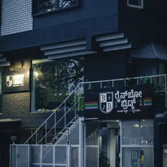 A night shot of our building, a beacon for creators and music lovers.