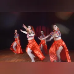 A snapshot from our performance video, showing the flow and movement of our red satin skirts. This routine was born from early mornings, lots of laughs, and a shared passion for salsa.