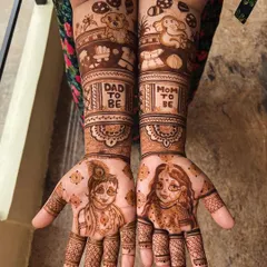 Celebrating the parents-to-be with custom lettering. This design features "Mom to be" and "Dad to be" bands, along with adorable portraits of baby Radha and baby Krishna.