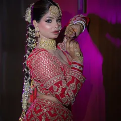 A full profile of the Sikh bridal look, showcasing the beautiful braided hairstyle and traditional jewellery.