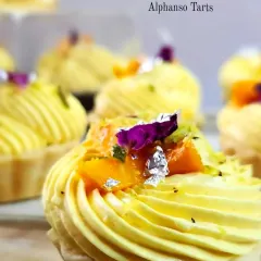 My Alphonso Tarts are another seasonal specialty. A buttery tart shell is filled with mango cream and topped with a swirl of mango-infused frosting and fresh fruit.
