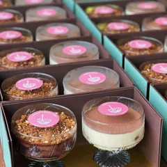 Inside the Ganga Realty corporate gift boxes. Each box contained a duo of our popular dessert cups: the rich Chocolate Salted Caramel Trifle and the timeless Classic Tiramisu, providing a delicious experience for their recipients.