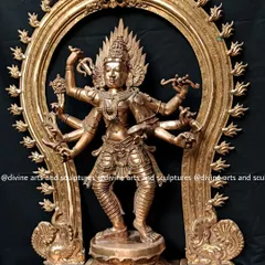 Here is our depiction of Bhadrakali, a fierce and protective form of the great Goddess. This 32-inch Panchaloha sculpture, framed by a traditional Prabhavali arch, captures her dynamic energy and intricate details, from the weapons in her hands to the cosmic dance of her posture.