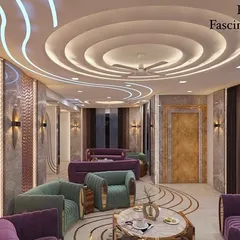A 3D render of a living room with a complex, multi-level ceiling design featuring concentric circles and cove lighting. This concept shows how we use ceilings to define spaces and add a layer of architectural interest.