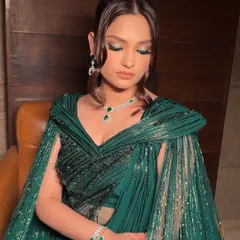 A closer look at the eye makeup for this glamorous green ensemble. I used a hint of metallic green on the lids with a sharp, extended liner to create a look that is both modern and perfectly coordinated with the outfit.