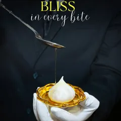 I believe in serving tradition with a touch of elegance. Here, one of my team members is drizzling golden ghee over a handcrafted Ukadiche Modak, a classic Maharashtrian sweet, presented on a golden plate for a truly royal feel.