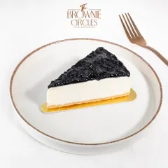 A classic done right. Our baked Blueberry Cheesecake features a creamy, rich cheesecake filling on a crisp biscuit base, topped with a generous layer of vibrant blueberry compote. It’s a perfect balance of sweet and tangy.