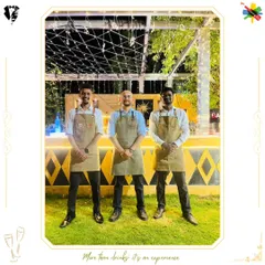 Three of our expert bartenders in uniform, ready to elevate a celebration with impeccable service.