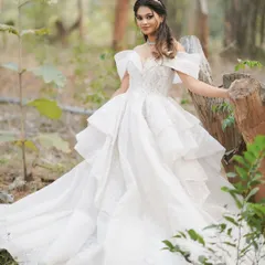 This image captures the dreamy, fairytale quality of a Christian wedding. The makeup is designed to look beautiful in natural, outdoor lighting.