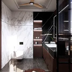 A bold and luxurious washroom design featuring a striking contrast of black and white marble. The clean lines, reflective surfaces, and effective lighting work together to create a space that feels both dramatic and impeccably clean.