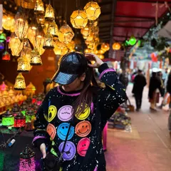 The beautiful lights and colors of the market make for a perfect photo backdrop.