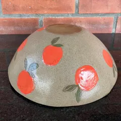 This bright and cheerful bowl with hand-painted oranges was made by a student in my 15-day combined workshop. It shows a wonderful use of underglaze colors on a hand-built form.