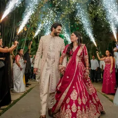 A spectacular Sangeet entrance with a sparkler archway. We capture the energy and excitement of the evening, making the couple the stars of their own show.