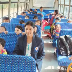 All smiles on the bus! Our students and teachers are excited as they head out for their educational field trip to the post office.