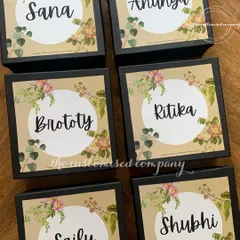 Simple, elegant, and personal. These beautiful favor boxes are customized with a floral design and the name of each guest, making them a lovely way to thank friends and family for being part of your special day.