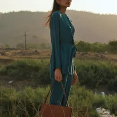 Using the golden hour light to create a warm, windswept portrait. The landscape becomes an essential part of the story, adding a sense of freedom and space.