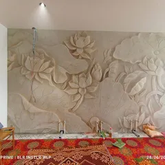 This is a 3D wallpaper that looks like a carved stone mural. The lotus design has depth and texture, creating a serene and artistic feature wall, perfect for a prayer or living room.