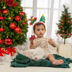 A little reindeer ready for Christmas. My studio is fully decorated for the holidays to create a magical, festive atmosphere.