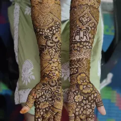 Your story, told in henna. I specialize in personalizing your bridal mehndi, like weaving you and your partner's initials seamlessly into the floral and geometric patterns.