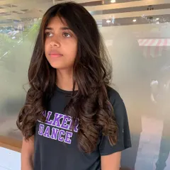 For Anjali, I created these beautiful caramel highlights and brown tones. This is a great first-time color as it's subtle and grows out gracefully.
