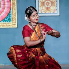 Abhinaya, or the art of expression, is the soul of Bharatanatyam. In this moment, I am portraying a specific emotion from a story, using hand gestures (mudras) and facial expressions. In my classes, we focus deeply on these storytelling techniques to make the dance meaningful.