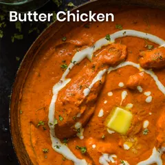Our classic Butter Chicken, rich and creamy, is a comforting indulgence. We use a perfect blend of spices, tomatoes, and cream to create this beloved dish.