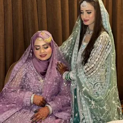 A sweet moment between the Devrani and Jethani (sisters-in-law). I did the makeup for both of these beautiful women, including the lovely Hijabi bride in the lavender outfit.