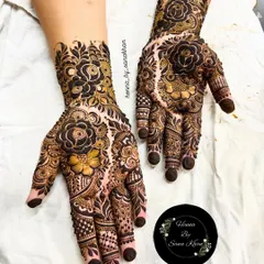 A dense and dark floral design that makes a statement. The use of negative space makes the rose motifs pop, creating a dramatic and beautiful effect.