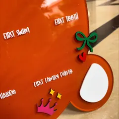 Zooming into the magic of the teddy bear milestone board. This project involved 3D cutouts, a scalloped banner with the baby's initial, and UV printing on an acrylic base, a new technique I was excited to try.