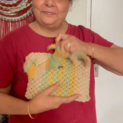 This multi-colored macrame bag shows how you can play with different shades. The optional lining ensures that even small items like safety pins stay secure inside.