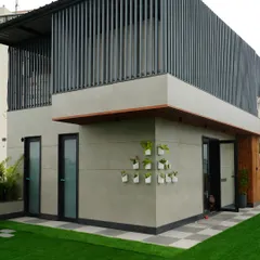 This terrace in DLF Phase 4 was transformed with a sleek, modern mumty cover, wall planters, and a checkerboard path. We focus on blending functionality with elegance to make every part of your terrace beautiful.