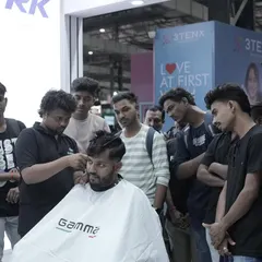 A shot from a live haircutting demonstration. I enjoy sharing my techniques and passion for barbering with others in the industry.