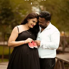 A sweet moment between the parents-to-be. The makeup is kept minimal and radiant to highlight her natural pregnancy glow.