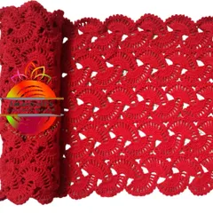 A close-up of the lacy stole in a vibrant red. The openwork pattern makes it lightweight and elegant, perfect for draping over your shoulders.