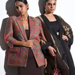 For this Indian fashion campaign, I focused on creating a look of modern royalty. The styling pairs a contemporary printed blazer with a metallic, flowing kaftan, showcasing how traditional textiles can be worn with a sharp, elegant edge.