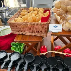 Our 'Kolkatta Puchka Lo' station, a crowd favorite for Indian street food lovers. We set up everything needed for guests to enjoy fresh pani puri, including the puris, spicy water, and various fillings.