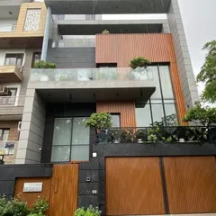 The completed Pitampura residence. As you can see, the final structure is a perfect match to our 3D design, from the material textures to the placement of the balcony planters.