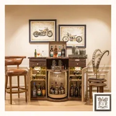 With the touch of a button, the 'Barn' bar opens to reveal a fully stocked interior with illuminated shelving and a rotating central display. It’s a piece that perfectly merges rustic charm with modern innovation.