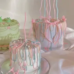 A collection of my custom-designed cakes, including the popular pastel ribbon style. I can recreate your favorite designs for any celebration.