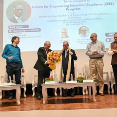 Capturing the moment Shri Narayana Murthy is welcomed on stage at the IIT-Delhi event. I focus on documenting the key interactions and formalities of high-profile events.