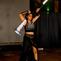 Another angle of the fire and LED staff, showing the contrast between the hot flame and the cool light.