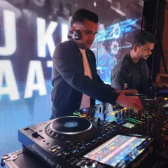 A close-up shot showing my focus while mixing. Every transition and track selection is deliberate, all part of building the right atmosphere for the event.