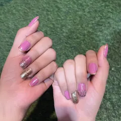 A beautiful bridal set combining soft pink polish with gold glitter accents and fine gold French tips. This design is both romantic and glamorous.