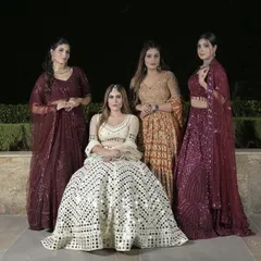 Presenting these glitter and glimmer embellished lehengas in shades of Ivory, Wine, and Rust. A trending pick of the season for the whole bride tribe.