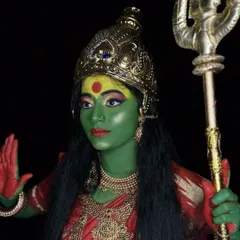 A powerful depiction of a goddess created for a Navratri-themed project. This look involves full-body paint and character-specific details, showcasing the transformative power of makeup.