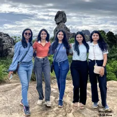 A group of friends posing at Phantom Rock in Wayanad. Our backpacking trips cover all the iconic spots and hidden gems.