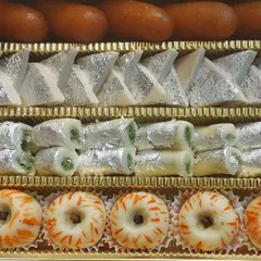 This assorted mithai box is a celebration in itself. It features a beautiful arrangement of our handmade sweets, including Kaju Katli, Pista Rolls, and fruit-inspired sandesh. We prepare these boxes for festivals and special orders, ensuring every piece is fresh and made with pure ingredients.