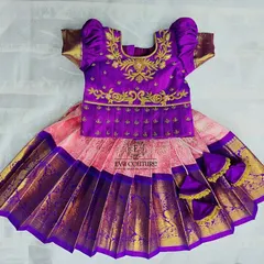 Perfect for twins or siblings, this set includes a newborn pattu lehenga and a matching kurta-dhoti. The rich purple fabric is adorned with gold embroidery, ensuring both your little boy and girl look coordinated.